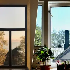 Ventajas del vidrio: vistas al mar y al jardín desde dos ventanas.