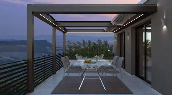 Elegantes cubiertas para terrazas áticos con iluminación LED, creando un espacio acogedor para disfrutar del atardecer.