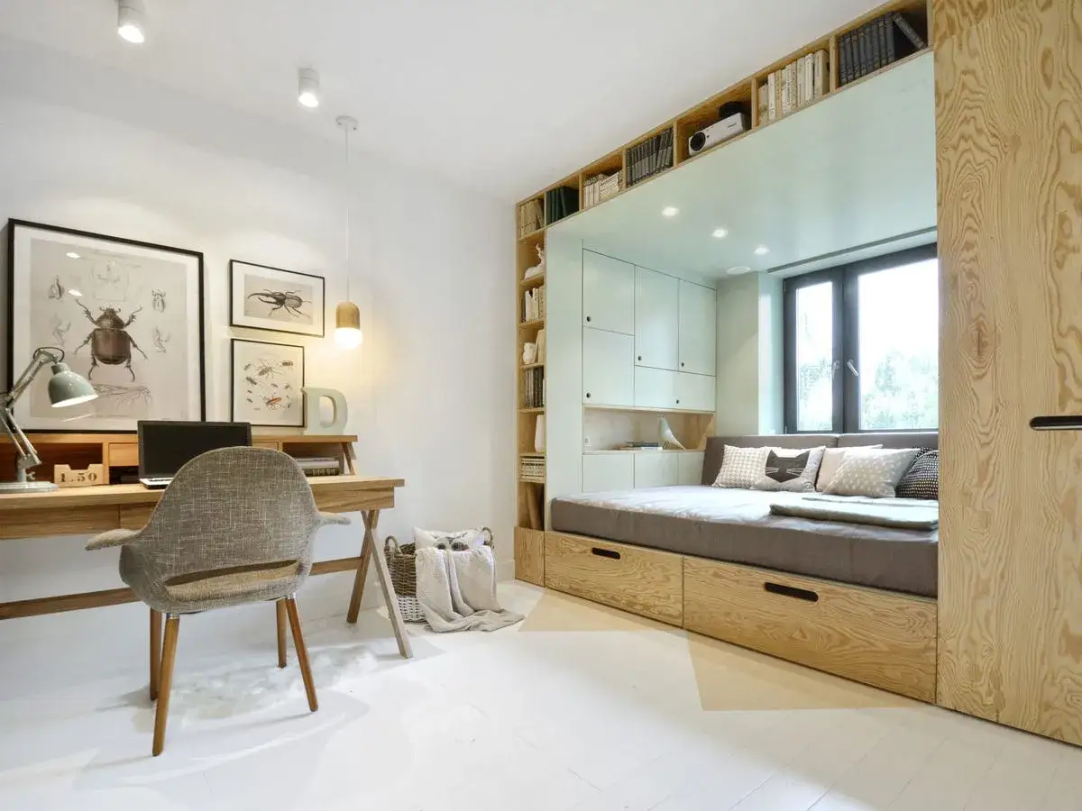 Plano de medidas de dormitorio juvenil con cama nido, escritorio y estanter&iacute;as integradas.